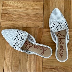 Sam Edelman white woven slip on flat mules.